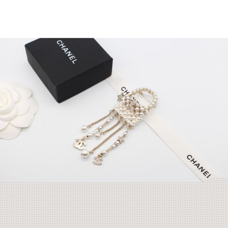 Ch*el brooches